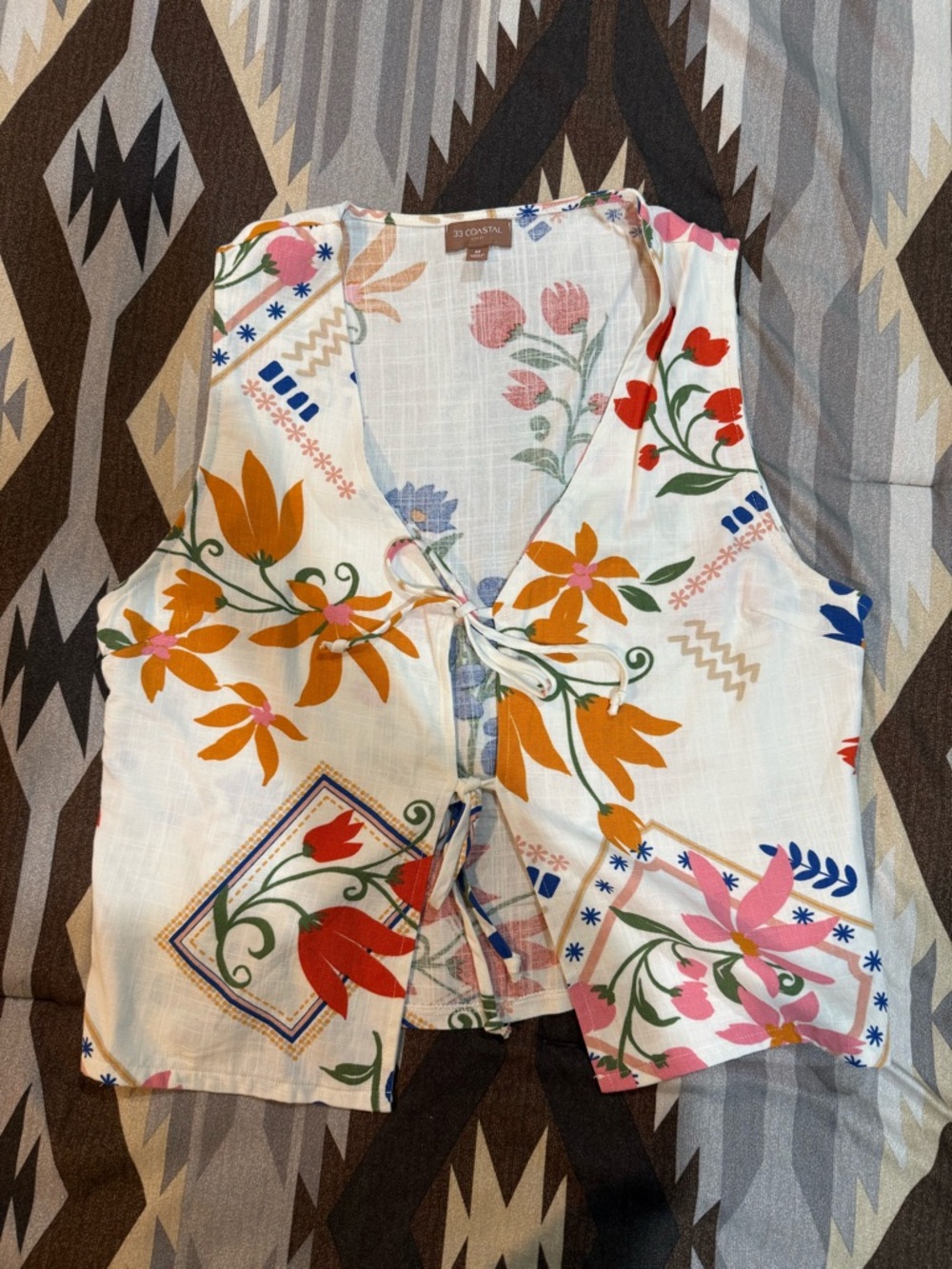 Buckle Floral Tie-Front Vest in White with Orange, Red, Pink, Blue